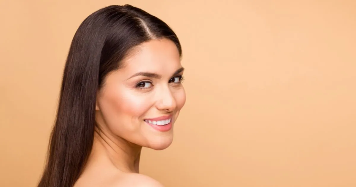 Radiant woman with glowing, hydrated skin from SkinVive in Wichita Falls, TX